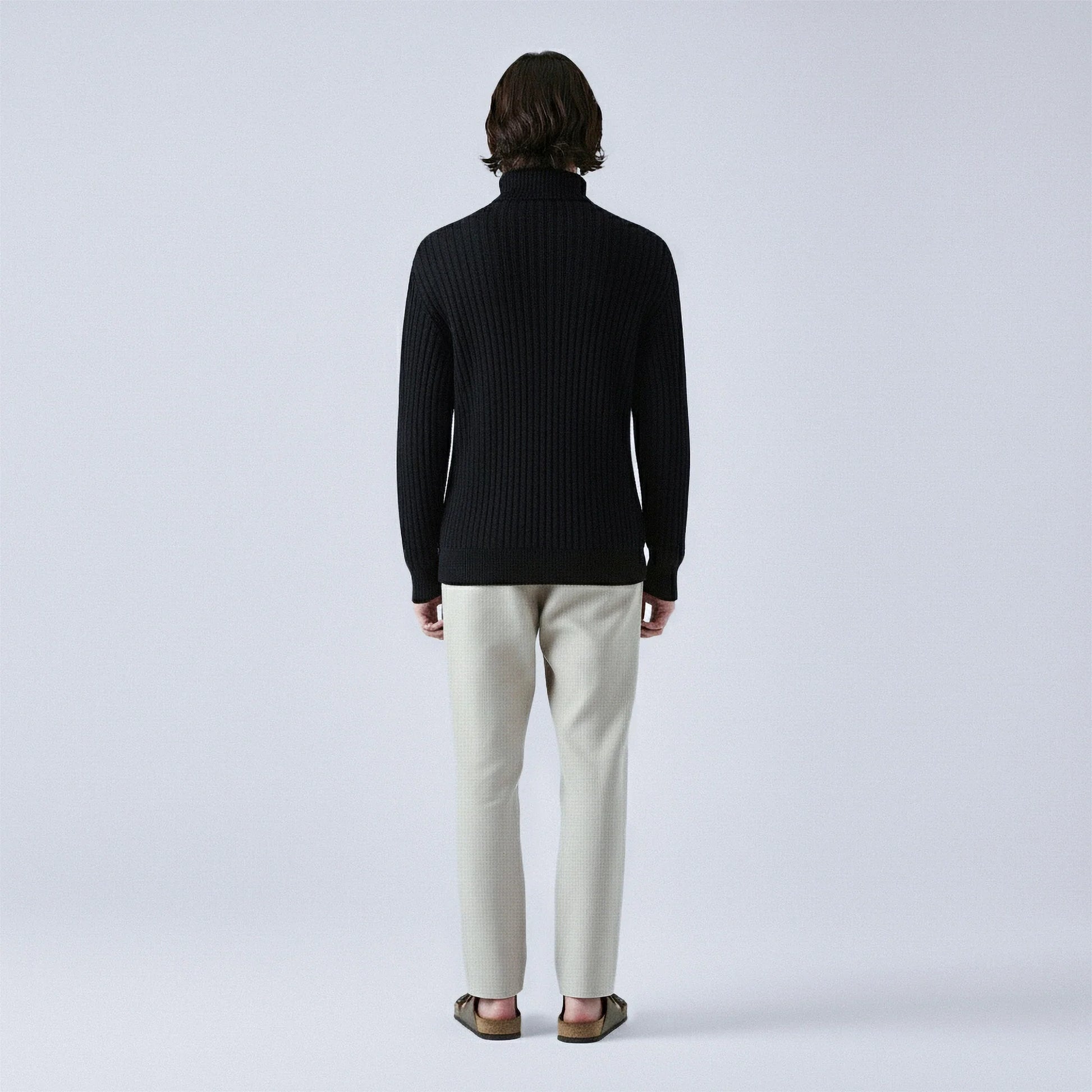 Maglione in lana a treccia con zip a metà collo