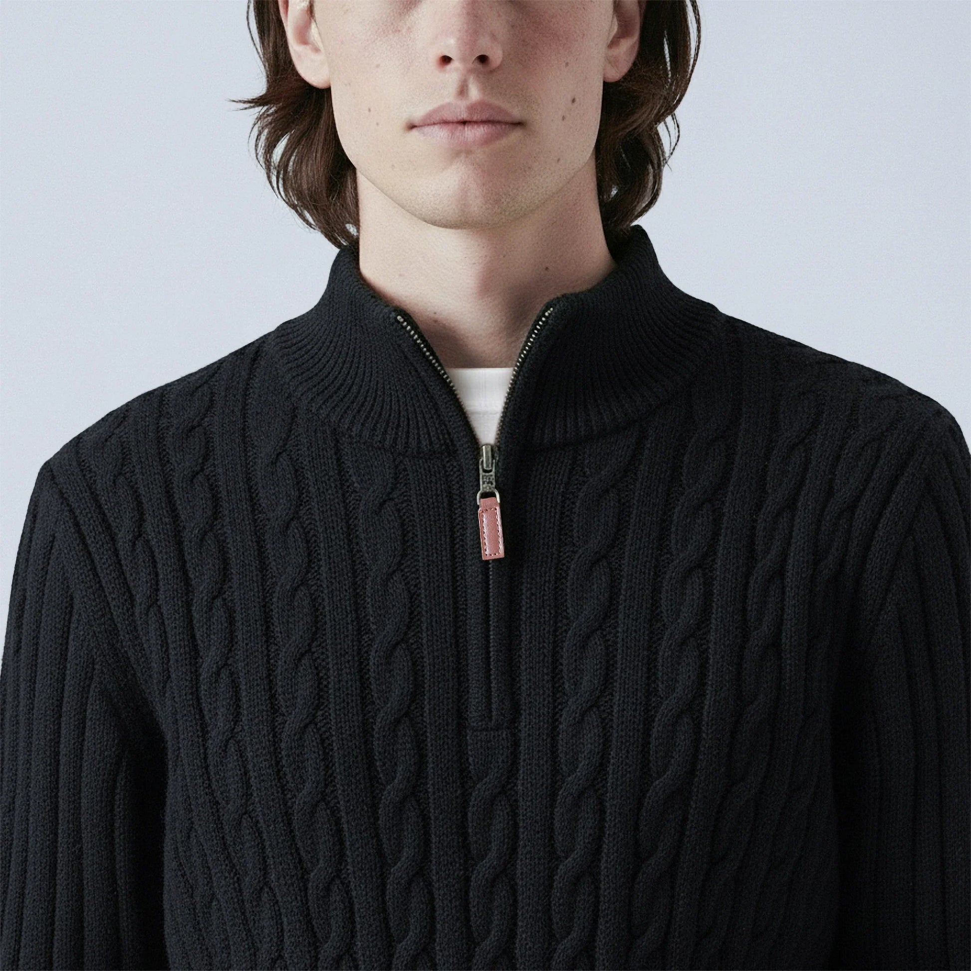 Maglione in lana a treccia con zip a metà collo